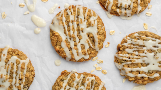close up of oatmeal butternut cookies drizzled with icing