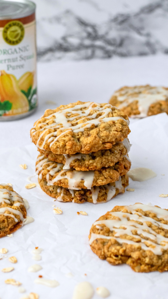 stack of oatmeal butternut squash cookies drizzled with icing